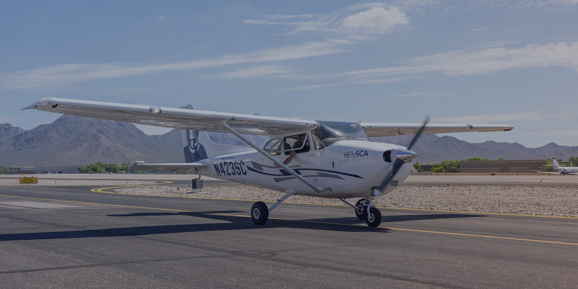 Sierra Charlie training aircraft on an Arizona runway
