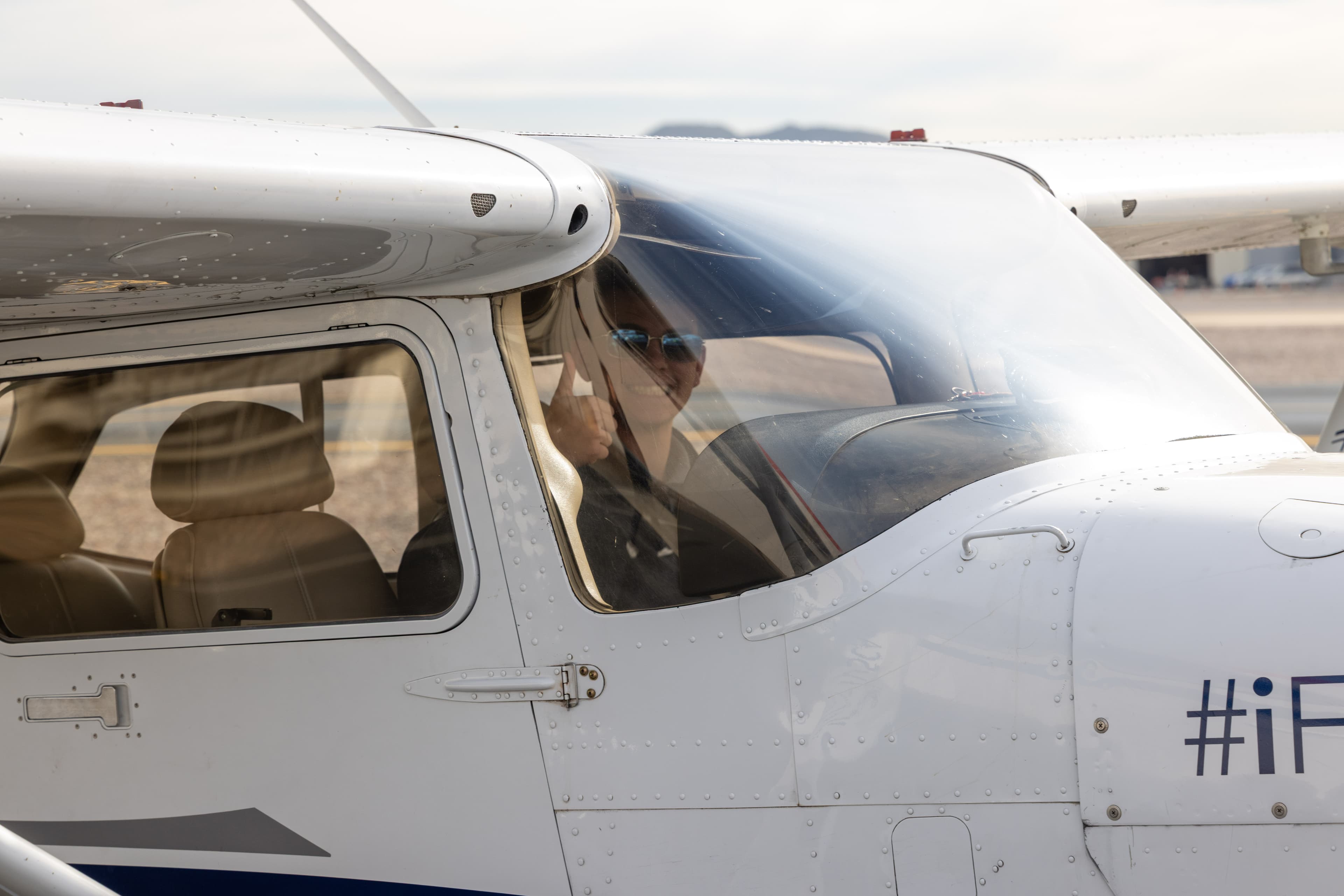 Sierra Charlie student pilot in the cockpit of a Cessna 172