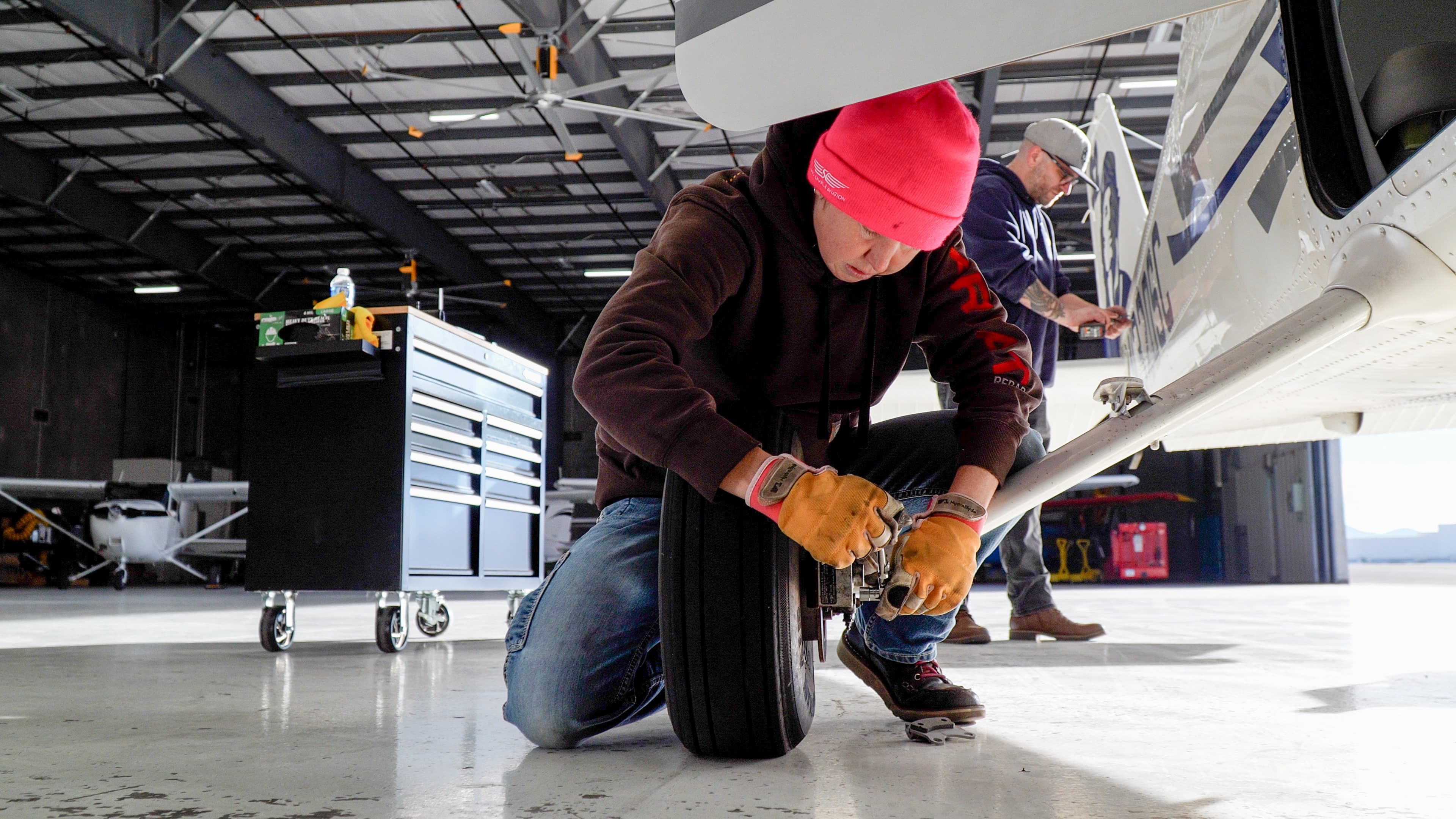 Mechanic working on a training aircraft